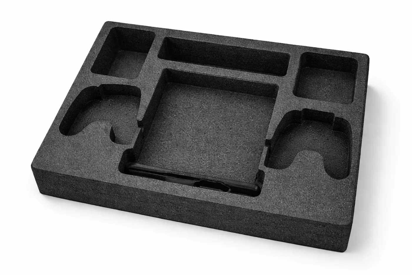 Black foam packaging insert tray with molded compartments